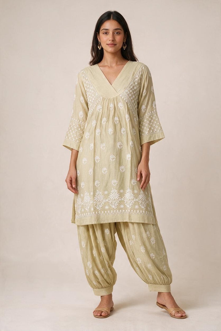 Luxe-Pure muslin luxurious kurti afgani pants set with *2 taar chikankari work*