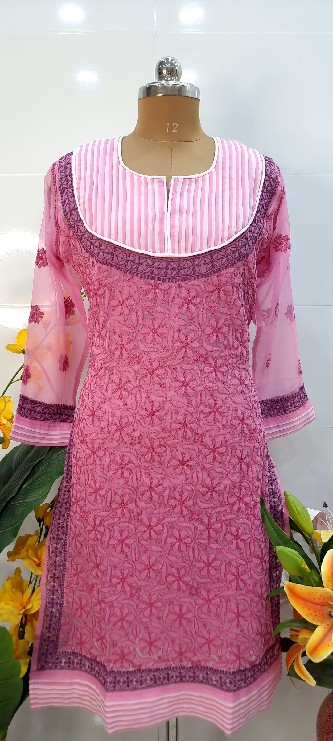lucknow dress design Introducing our stunning new dress from Meenakshi Lucknow Chikankari Designers! Made from soft, breathable cotton, this dress is perfect for any season. It features exquisite shadow work, beautifully combined with Mukesh and
